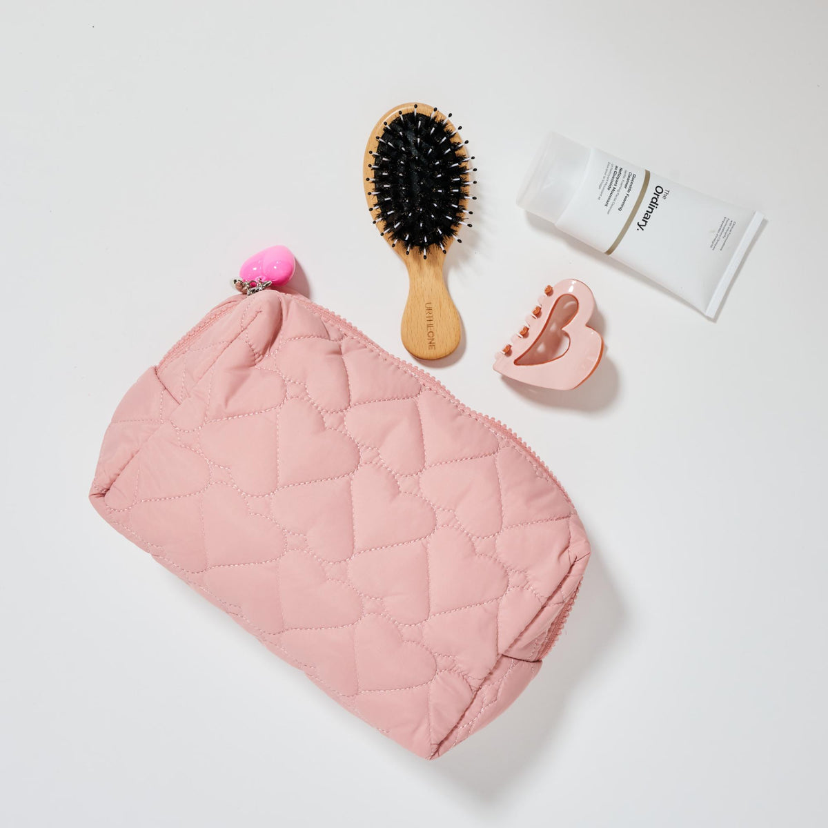 Woman wearing Rose Urban Essentials Pull My Heart Cosmetic & Travel Organizer Pouch 840611196989 View 1 | Rose