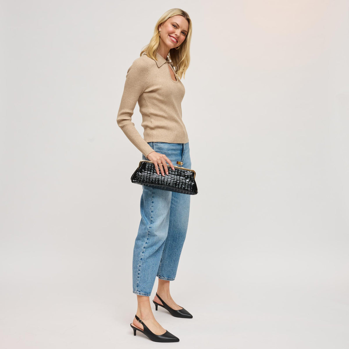 Woman wearing Black Urban Expressions Piper Clutch 840504200724 View 3 | Black