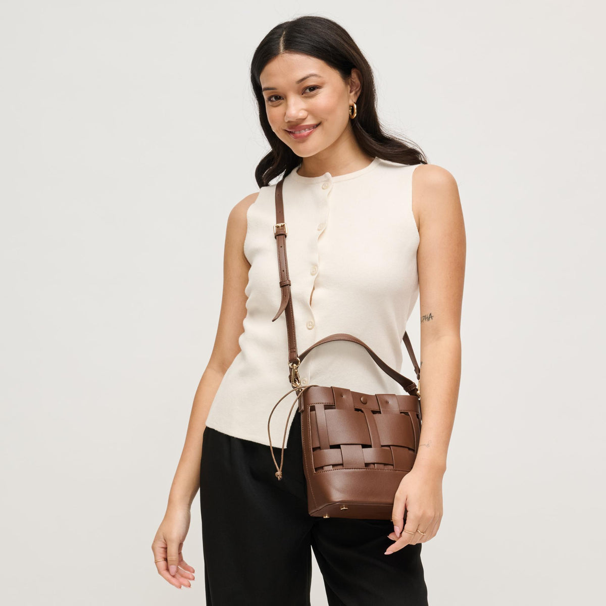 Woman wearing Chocolate Urban Expressions Parker Crossbody 840504205453 View 3 | Chocolate