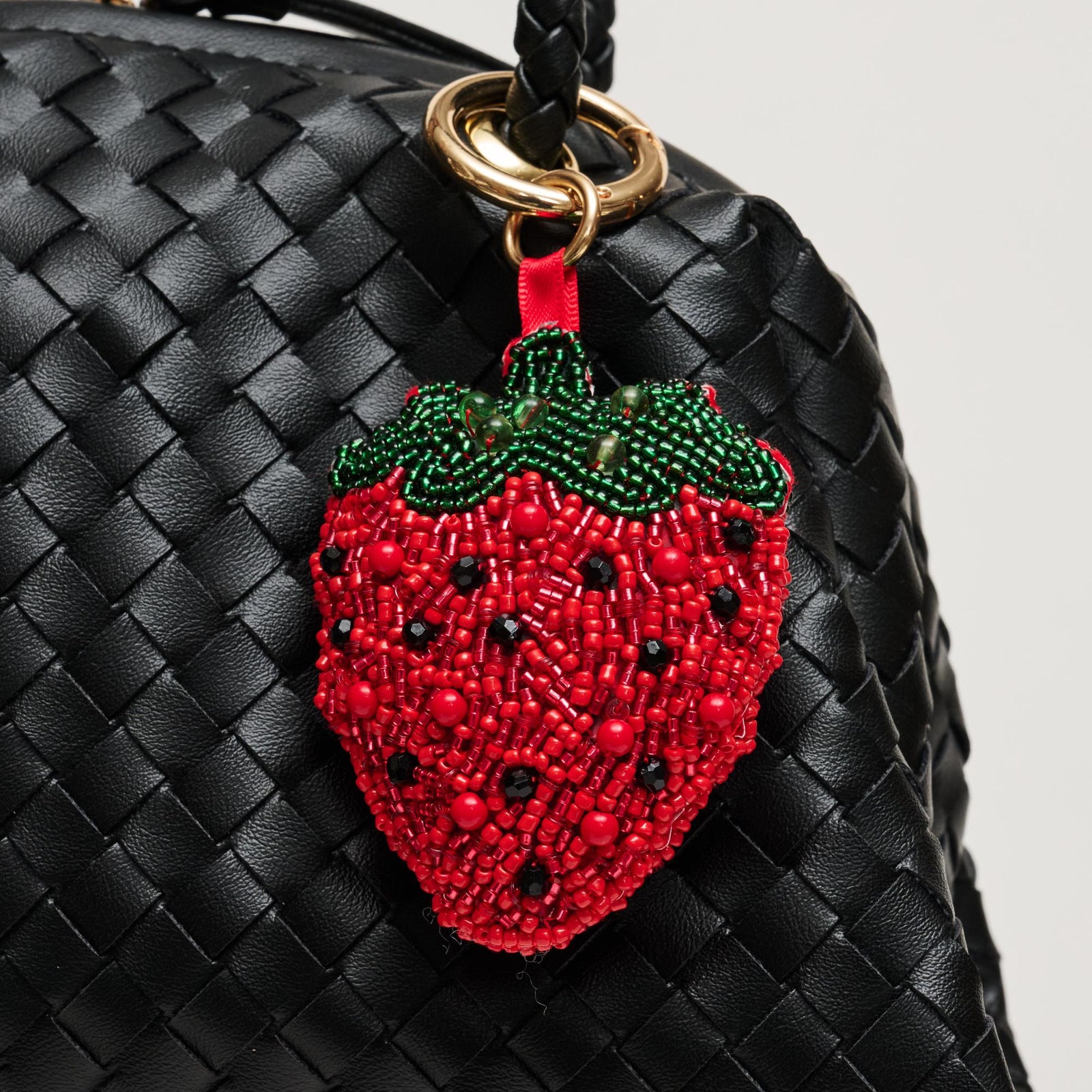 Woman wearing Strawberry Urban Expressions Berri Keychain Charm 840504209185 View 1 | Strawberry