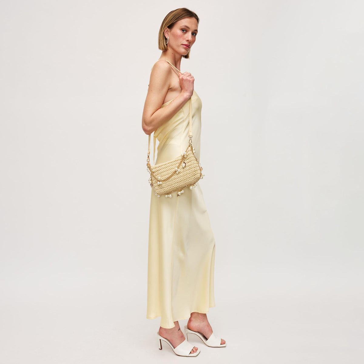 Woman wearing Ivory Urban Expressions Steph Evening Bag 840611148186 View 4 | Ivory