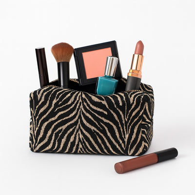 Woman wearing Natural Black Urban Essentials Zebrini Cosmetic & Travel Organizer Pouch 840611197825 View 1 | Natural Black