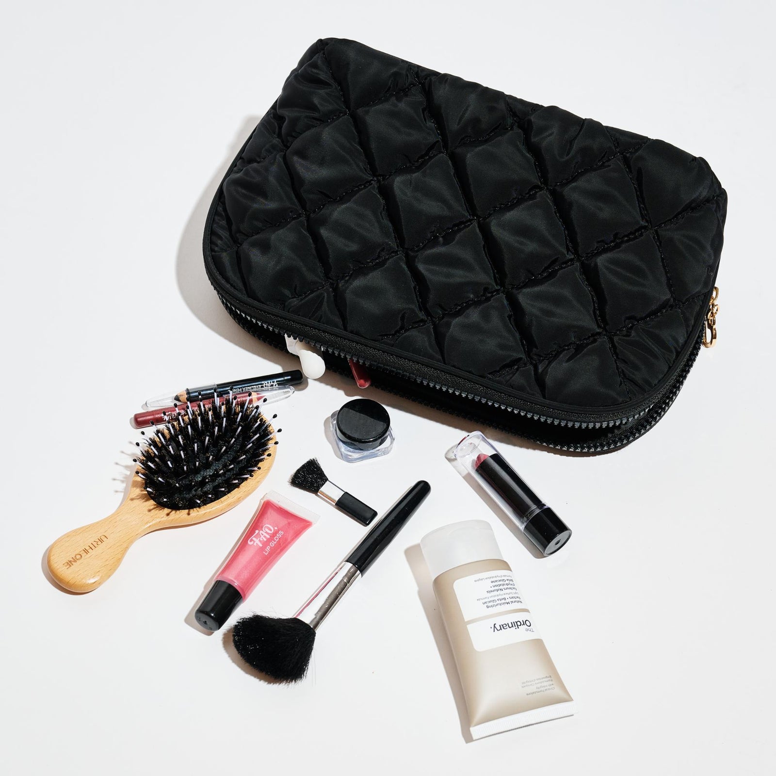Woman wearing Black Urban Essentials Cloud Kiss - Quilted Puffer Nylon Cosmetic & Travel Organizer Dome Pouch 840611197085 View 1 | Black