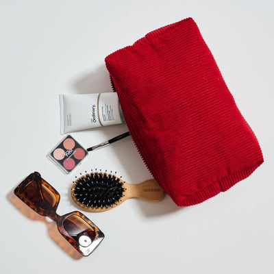 Woman wearing Red Urban Essentials Cordially Yours - Corduroy Cosmetic & Travel Organizer Pouch 840611197047 View 1 | Red