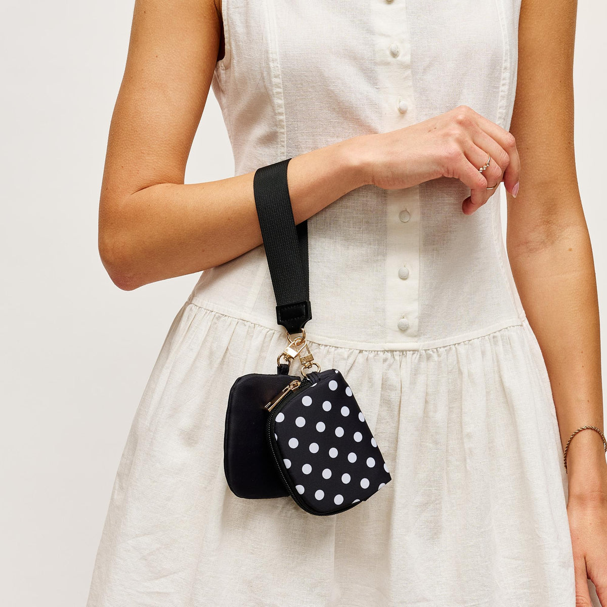 Woman wearing Black Urban Expressions Link & Carry - Polka Dot Wristlet 840504202704 View 2 | Black