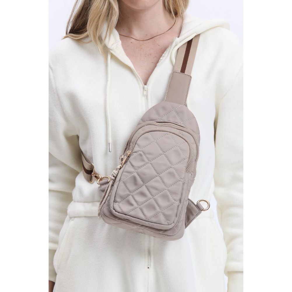 Woman wearing Nude Urban Expressions Ace - Quilted Nylon Sling Backpack 840611116598 View 4 | Nude