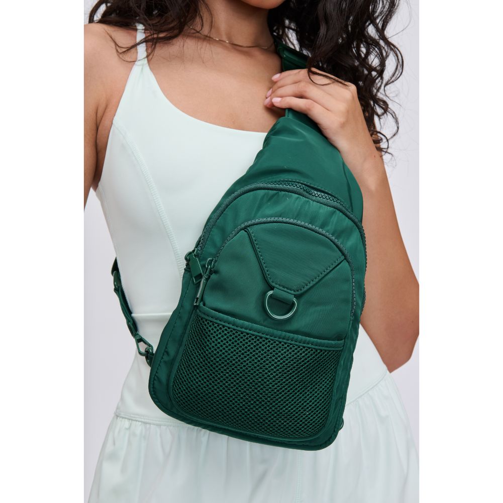 Woman wearing Forest Urban Expressions Walker - Nylon Sling Backpack 840611114372 View 1 | Forest