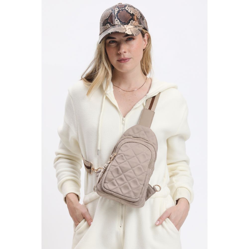 Woman wearing Nude Urban Expressions Ace - Quilted Nylon Sling Backpack 840611116598 View 2 | Nude
