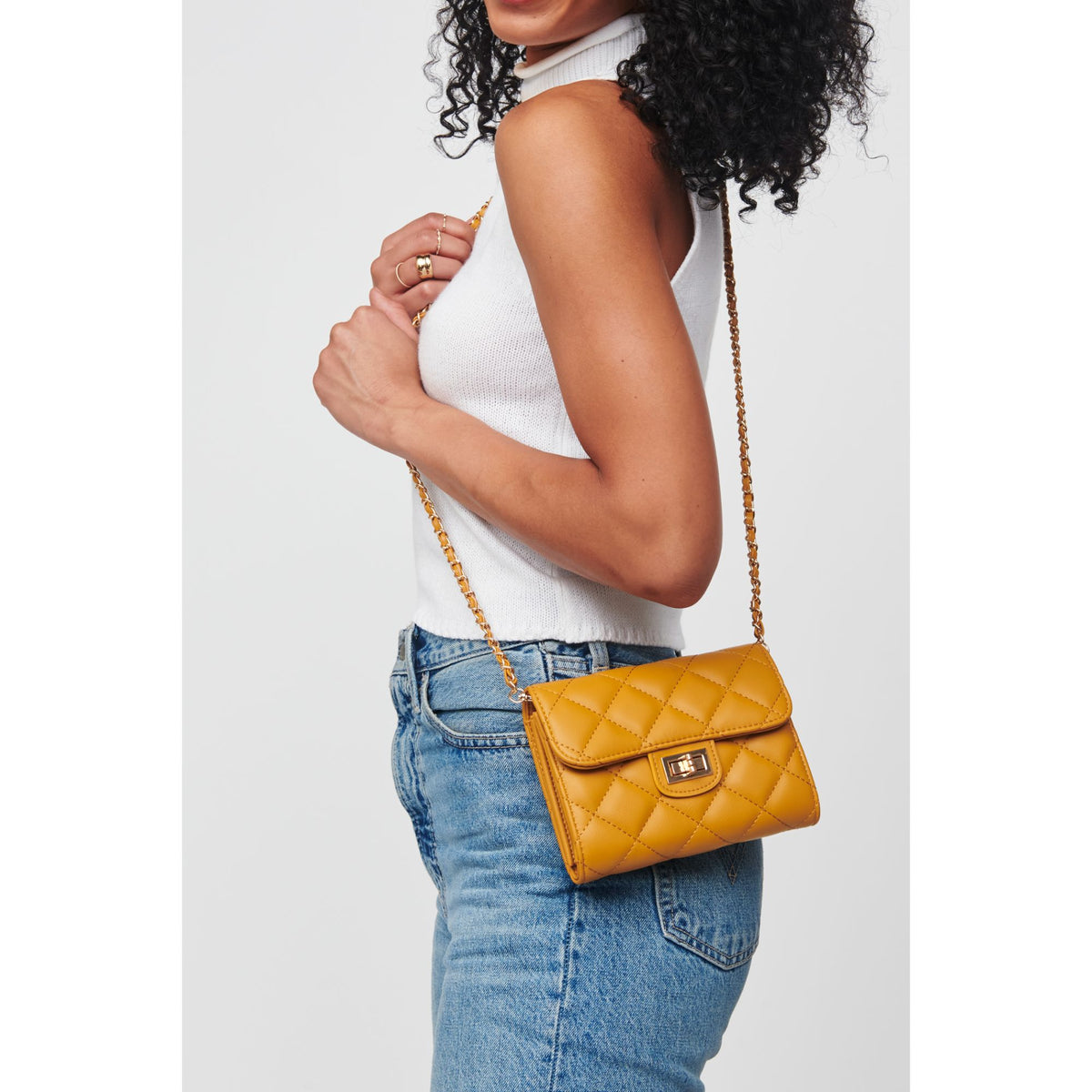 Woman wearing Mustard Urban Expressions Wendy - Quilted Crossbody 818209012621 View 1 | Mustard