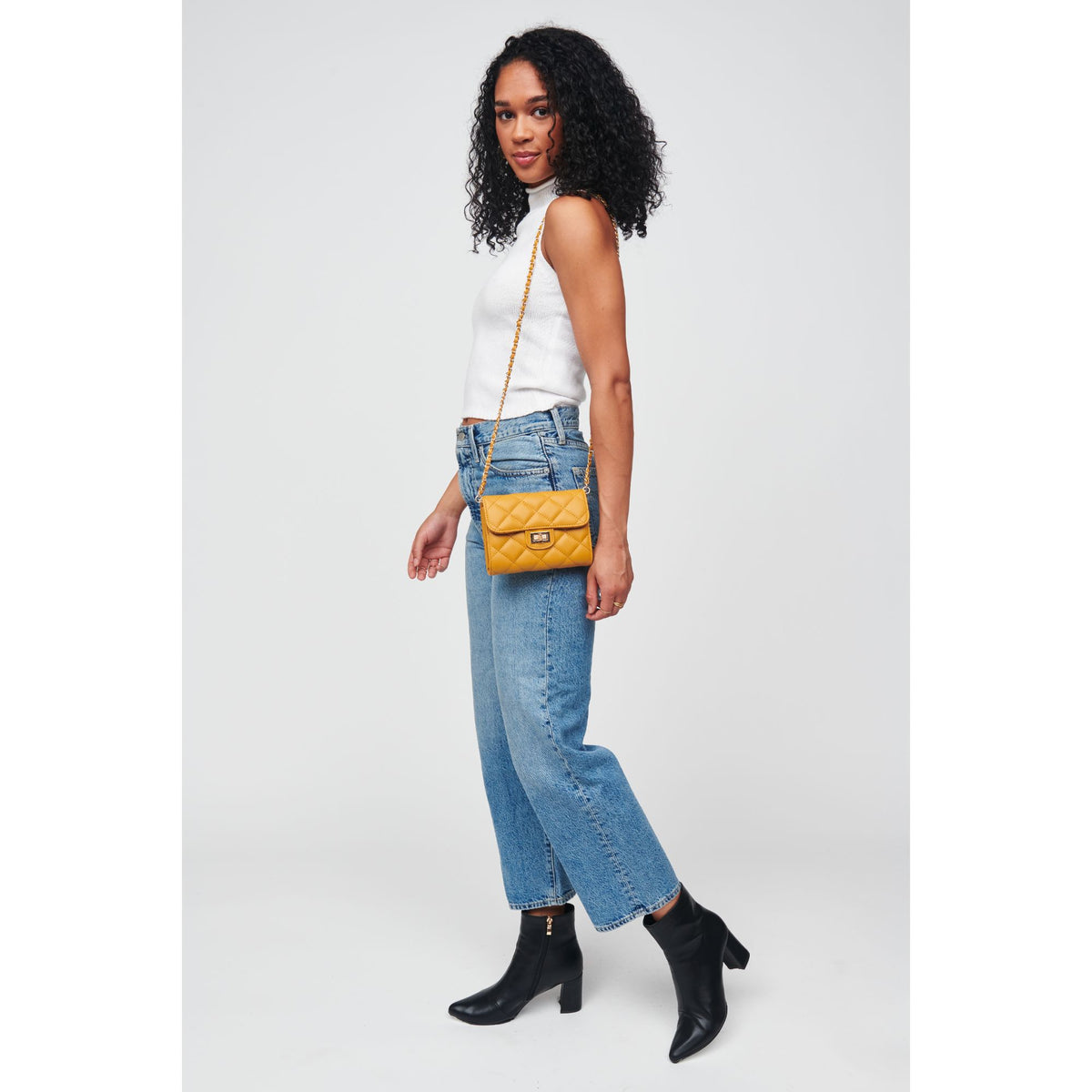 Woman wearing Mustard Urban Expressions Wendy - Quilted Crossbody 818209012621 View 3 | Mustard
